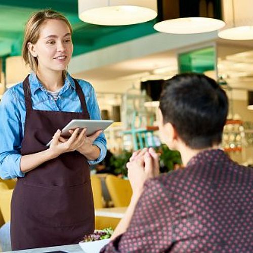 happy-young-waitress-working-in